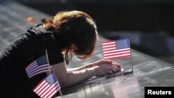 Памятная церемония в честь погибших в теракте 11 сентября