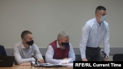 Карелия. Суд над руководством ИК-9. Слева сидит Иван Савельев, справа стоит Иван Ковалев.