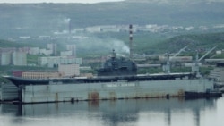 Плавучий док ПД-50 затонул при выходе из него авианесущего крейсера "Адмирал Кузнецов" Плавучий док ПД-50 затонул при выходе из него авианесущего крейсера "Адмирал Кузнецов"