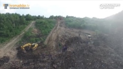 Гигантский оползень на свалке в Львове: под завалами может находиться четверо человек Гигантский оползень на свалке в Львове: под завалами может находиться четверо человек