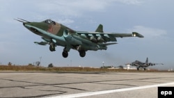 Российский бомбардировщик SU-25 на авиабазе Хмеймим в Латакии, Сирия, октябрь 2015 года