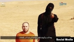 Мохаммад Эмвази в одном из роликов ISIS