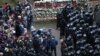 Belarus - Belarusian law enforcement officers surround demonstrators during a rally to reject the presidential election results in Minsk, November 15, 2020