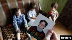 Семья жительницы Вязьмы Светланы Давыдовой, фото Reuters 30 января 2015 г