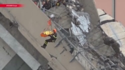 В Генуе рухнул автомобильный мост, десятки человек погибли В Генуе рухнул автомобильный мост, десятки человек погибли