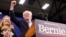 Democratic U.S. presidential candidate Senator Bernie Sanders is accompanied by his wife Jane O’Meara Sanders and other relatives as he speaks at his New Hampshire primary night rally in Manchester