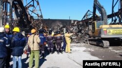 Разбор завалов на месте пожара ТЦ "Адмирал"